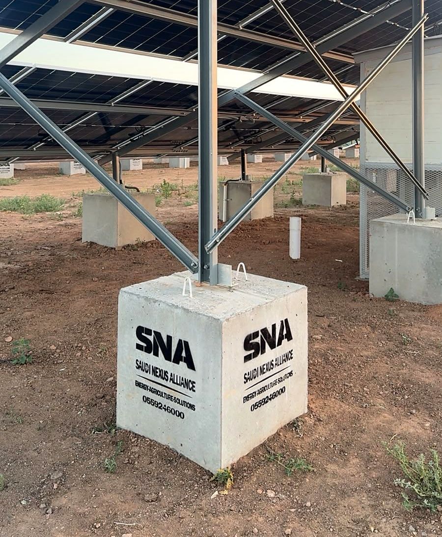 A concrete footing stamped SNA at one of SNA's stations